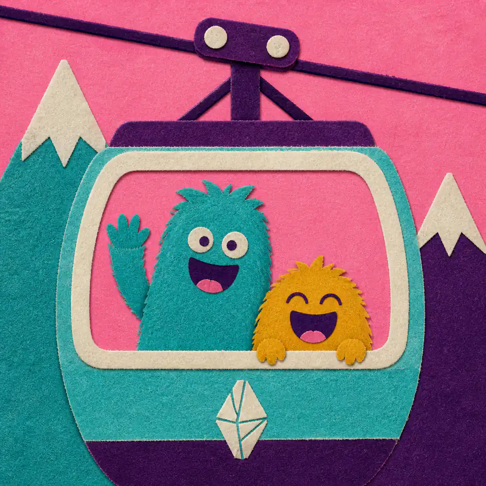 Two fuzzy friends waving from a turquoise mountain cable car